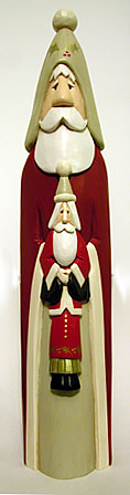 Santa carving with Santa doll